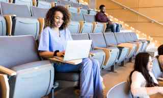 Nursing student in a lecture hall.
