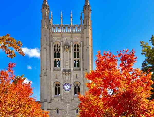 Memorial Union on Mizzou's campus with brightly-colored fall leaves.