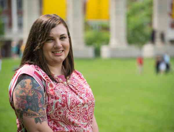 Stacy Brummer, BHS ’15, stands in front of the Mizzou columns.