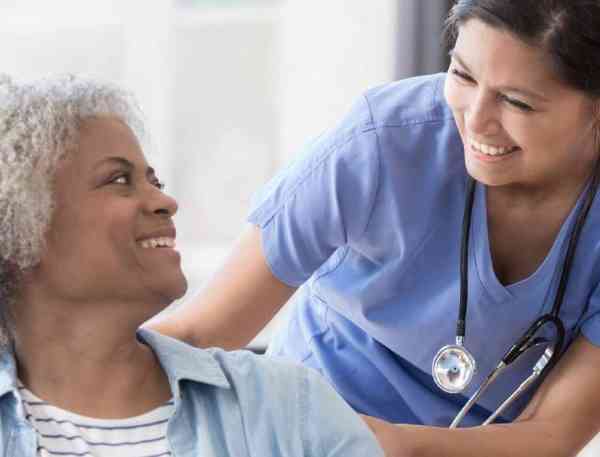 A nurse and patient.