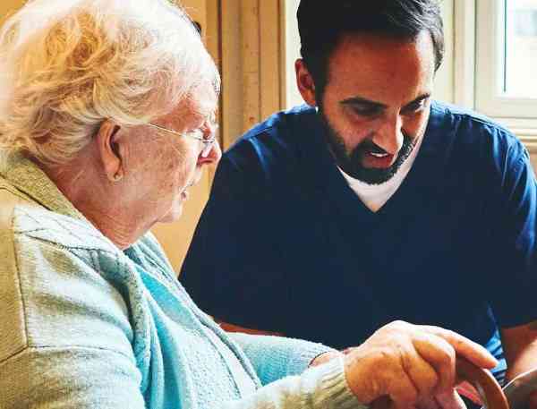Social worker and elder patient.