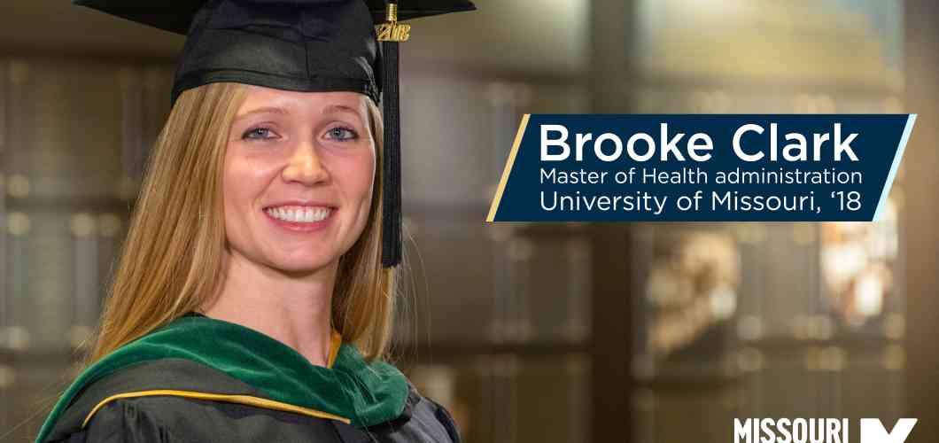 Brooke Clark, MHA, wearing her graduation cap and gown.