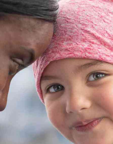 Pediatric clinical nurse specialist with a young patient.