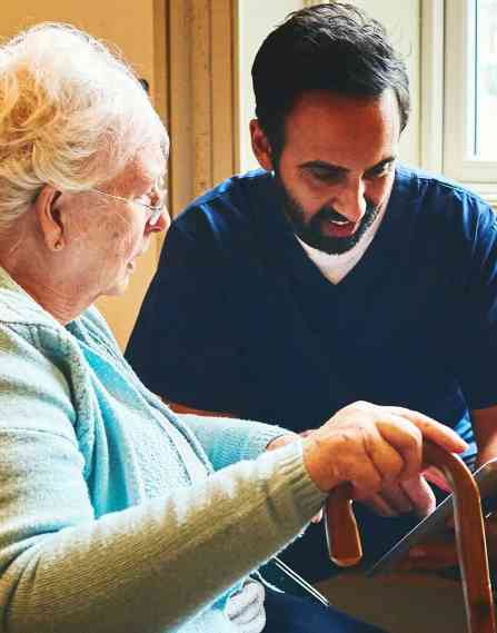 Gerontological social worker and client.