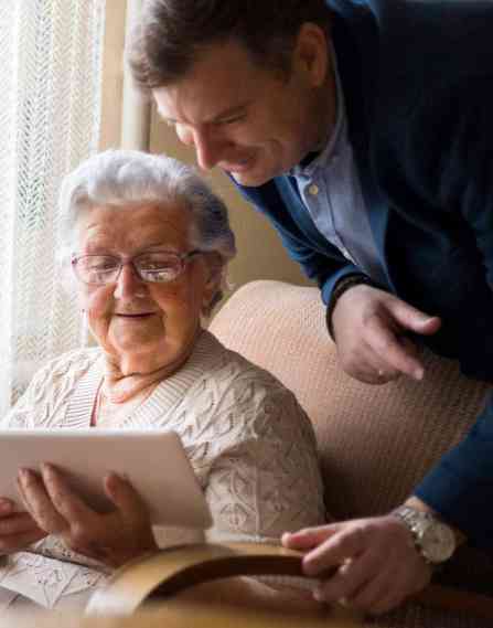 Gerontological social worker and client.