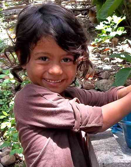 Child washing hands.