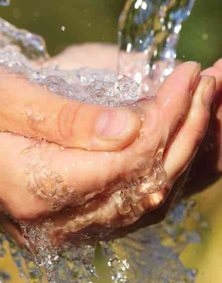 Someone washing their hands.