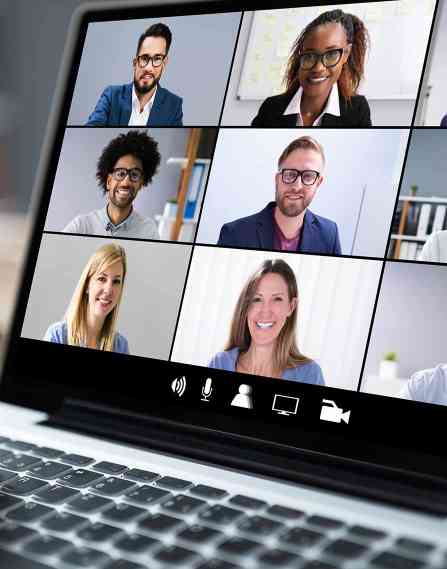 Media professionals on a laptop screen.