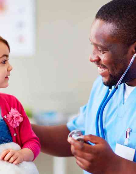 Pediatric clinical nurse specialist with a young patient.