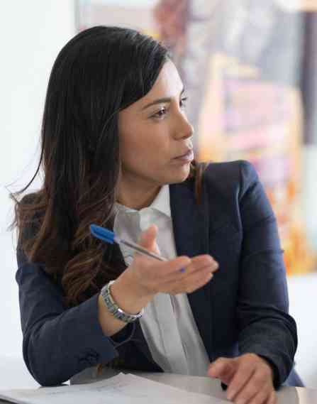 Personal financial planner speaking to clients.