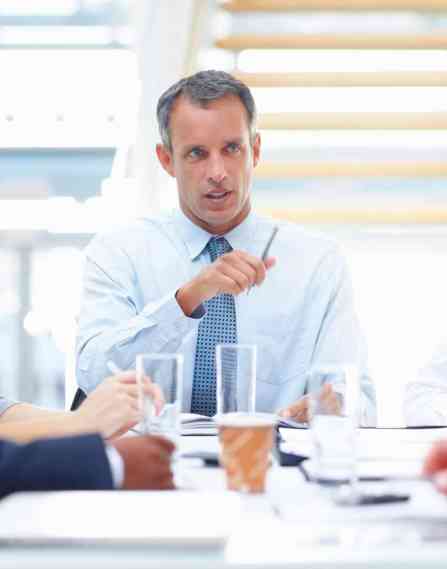 Public affairs professional speaking to colleagues.