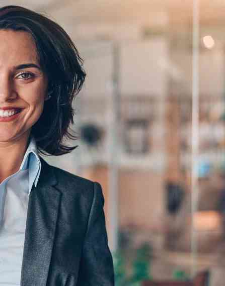 Portrait of a smiling young businesswoman in the office