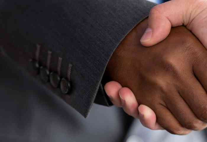 Law professionals shaking hands.