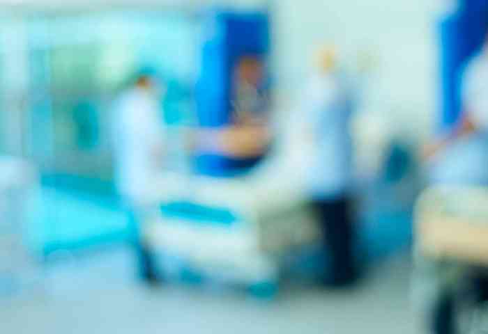 Blurred view of a hospital room.
