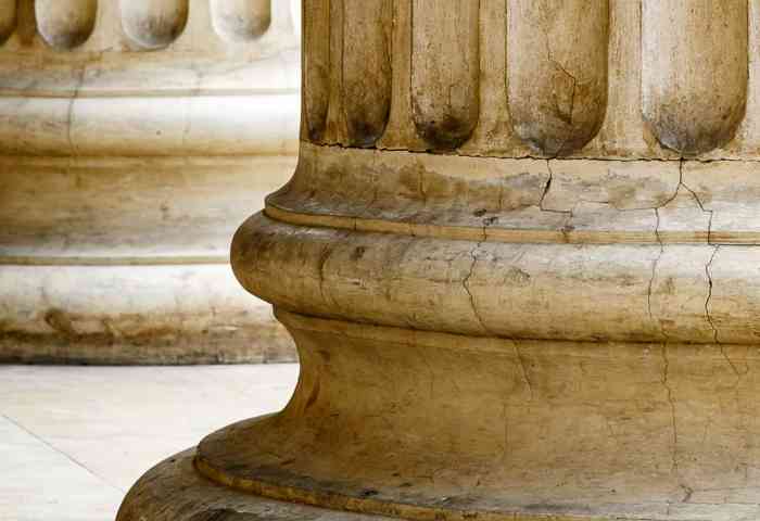 Columns made of stone at a government building.