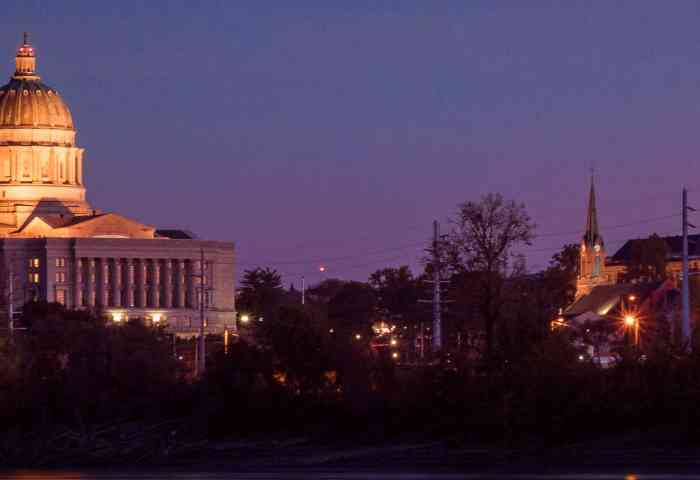 Skyline view of a capital building at dusk.