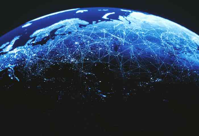 Earth from space with abstract data overlays in blue.