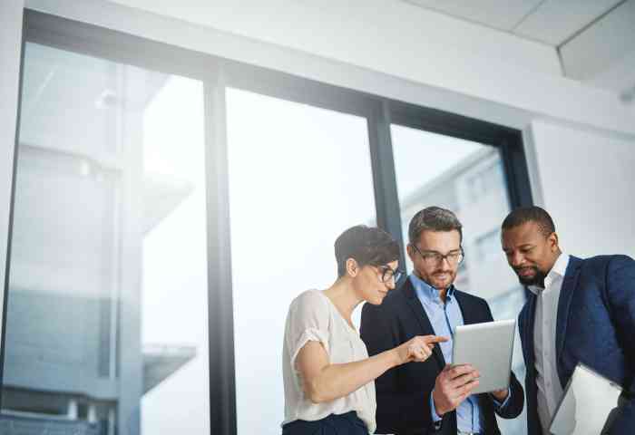 a group of people in business clothes