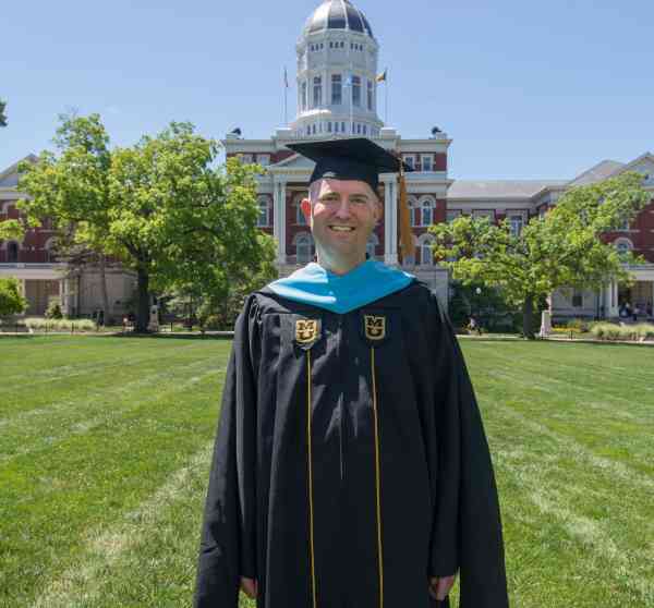 David Ceule, EdSp, in his graduation cap and gown.